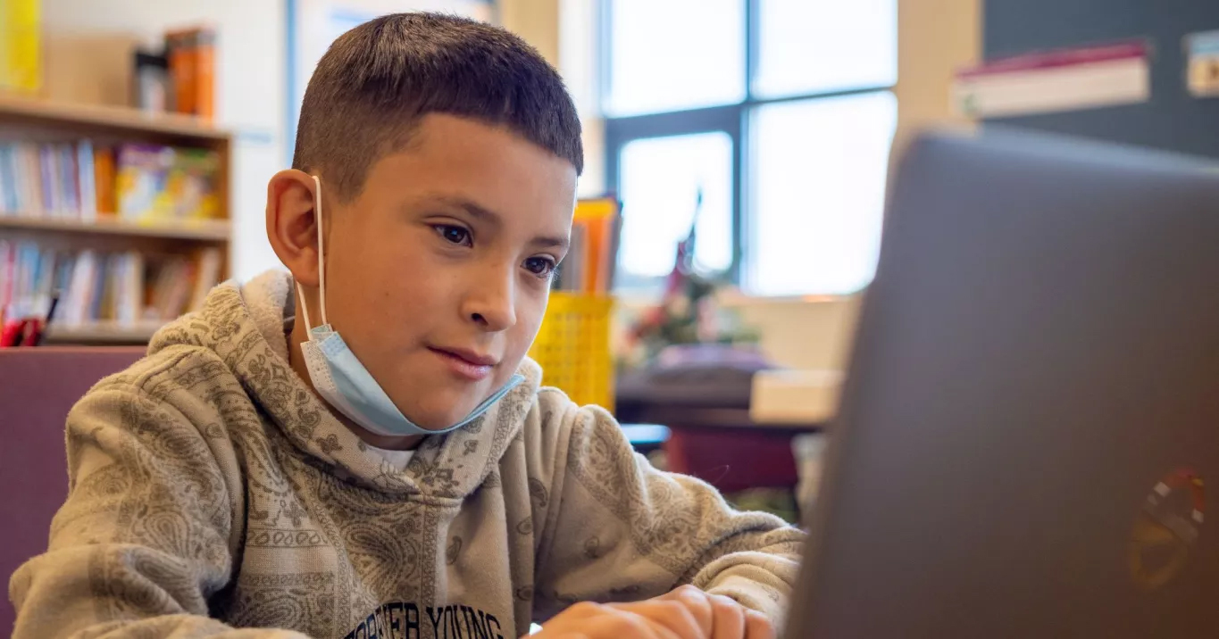 student working on computer