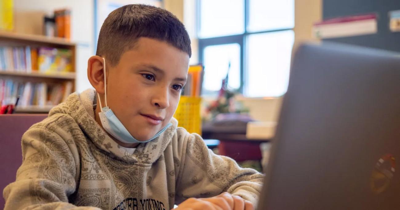 student working on computer